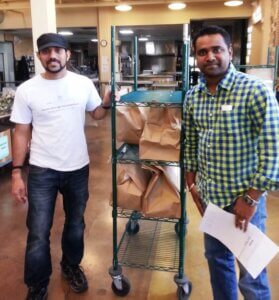 Volunteers Vinesh and Anand at Project Angel Heart