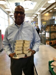 Sam Brown, area General Manager for Advantage Logistics—a SUPERVALU Company, in the Project Angel Heart kitchen. Brown delivered a gift from the SUPERVALU Foundation that will fund more than 2,200 meals for people living with cancer, HIV/AIDS, kidney disease, and other serious conditions.