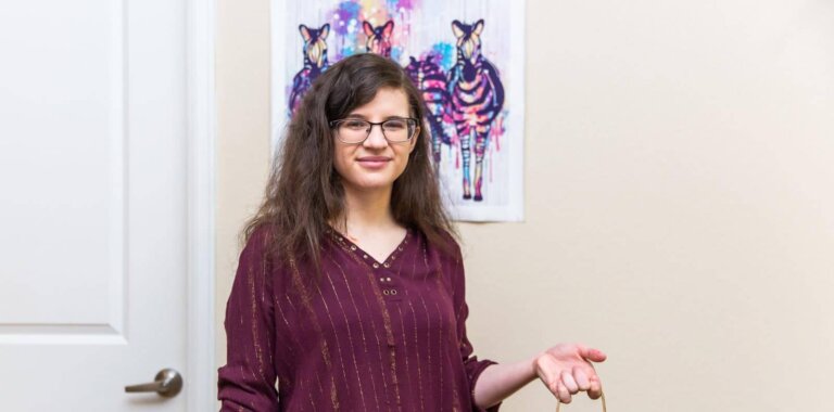 Claire holding a meal bag