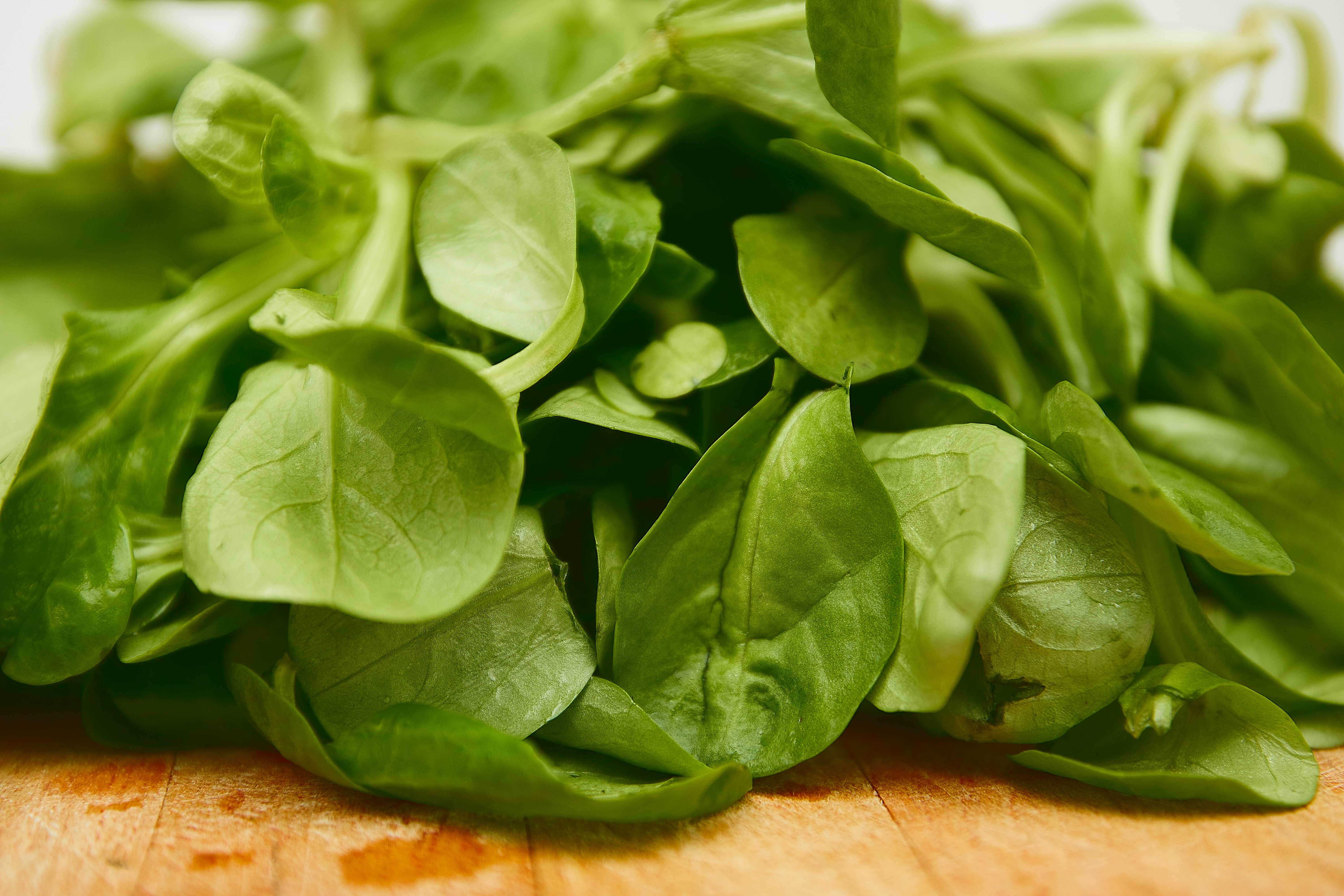spinach on cutting board