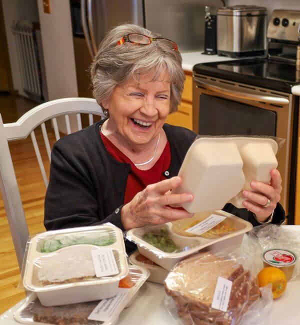 Client Carmen with Project Angel Heart meals