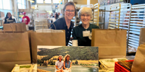 Anne and Cindy with a photo of them when they were younger