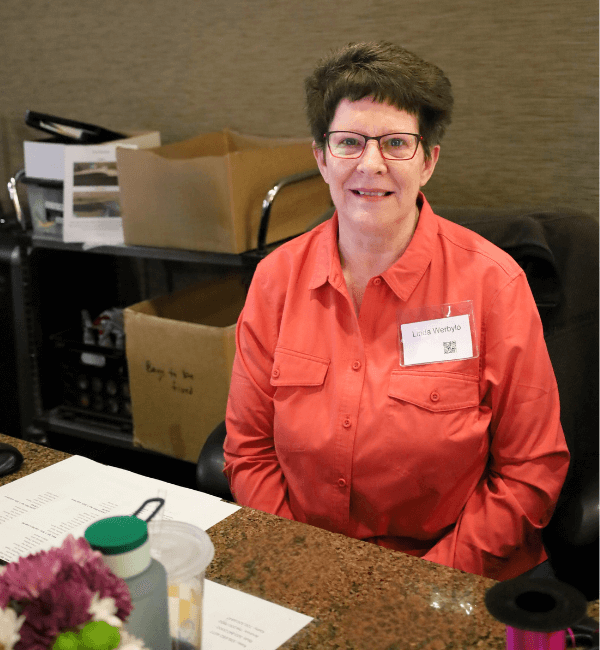 Linda at the front desk