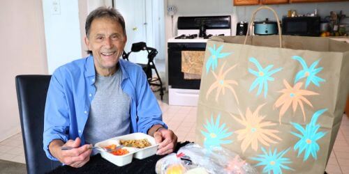 Client Ronald eating a meal